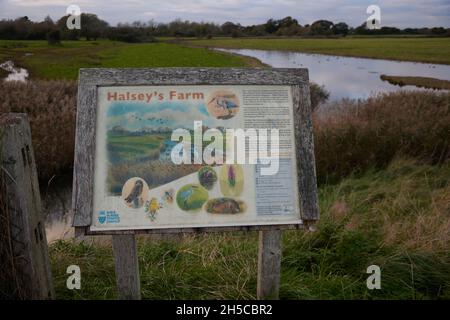 Information board of Halsey's Farm seen in Pagham Harbour Nature Reserve. Stock Photo