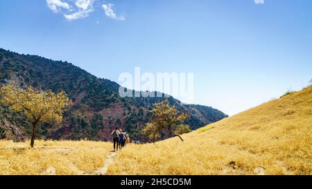 August 25, 2016, Shirkent, Tajikistan: A group of tourists on a trail in Hissar Valley in Tajikistan Stock Photo