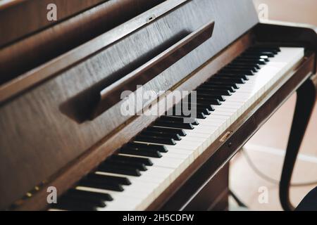 Closeup shot of an old brown german piano Stock Photo