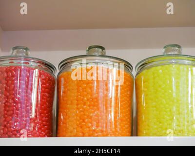 Candy Stored in Glass Jars on Display Stock Photo