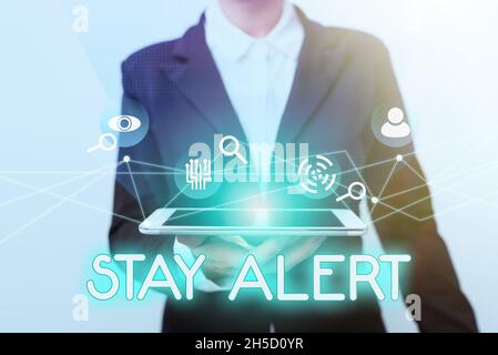 Writing displaying text Stay Alert. Word Written on Paying full attention to things around Quick to see or understand Woman In Suit Standing Using Stock Photo