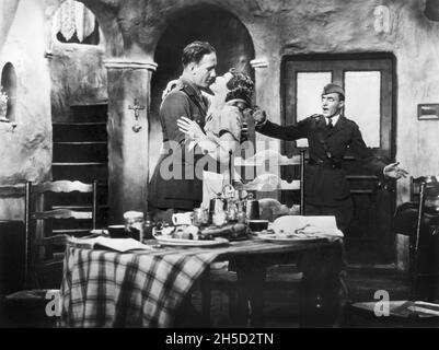 Haddon Mason, Madeleine Carroll, on-set of the British Film, 'French Leave', Sterling Films, 1930 Stock Photo