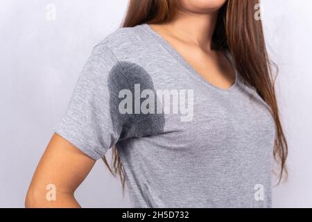 Woman feel bad with body odor problem Stock Photo