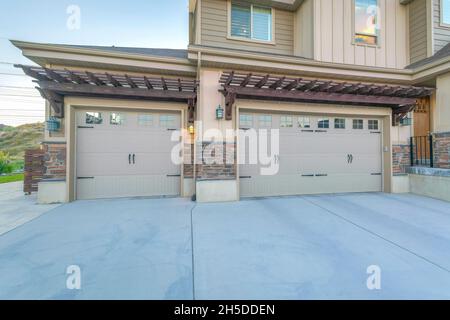 Three car parking garage with double side hinged doors Stock Photo