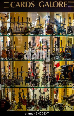 ZADAR, CROATIA - Oct 13, 2021: Many guitars on the display window in a souvenir store Stock Photo