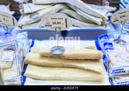 Pamplona, Spain - June 22, 2021: Dried pieces of salted cod or bacalao, traditional Spanish delicacy for sale at a market in the old town, Casco Viejo Stock Photo