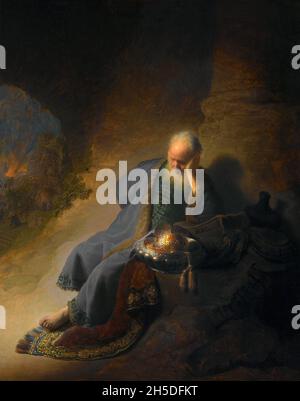 Palestine / Israel: 'Jeremiah Lamenting the Destruction of Jerusalem'. Oil on oak wood painting by Rembrandt (15 July 1606 - 4 October 1669), 1630.  Zedekiah had been installed as king of Jerusalem by the Babylonian King Nebuchadnezzar II following the Siege of Jerusalem in 597 BCE. But Zedekiah revolted against Babylon, and entered into an alliance with Pharaoh Hophra, the king of Egypt. In 589 BCE, Nebuchadnezzar began an 18-month siege of Jerusalem, eventually breaking down Jerusalem's walls and conquering the city. Jerusalem was plundered and most of its inhabitants were enslaved. Stock Photo