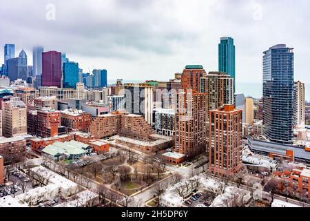 Ariel city view in Chicago of nondescript buildings near Lake Michigaan, showing an overcast Moody sky. Stock Photo