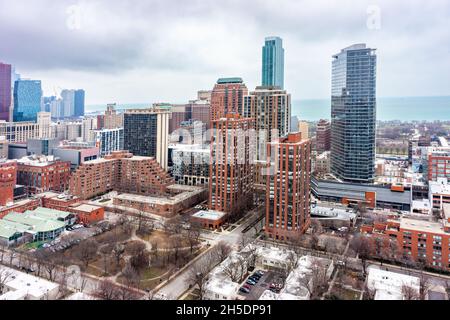 Ariel city view in Chicago of nondescript buildings near Lake Michigaan, showing an overcast Moody sky. Stock Photo