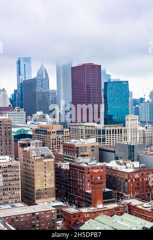 Ariel city view in Chicago of nondescript buildings near Lake Michigaan, showing an overcast Moody sky. Stock Photo