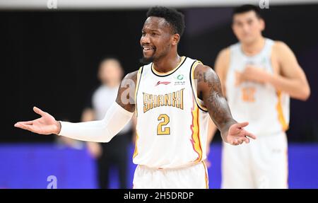 Qingdao(Shandong. 20th July, 2020. Ren Junwei (L) of Shanxi Loongs is  defended by Yang Jinmeng of Qingdao Eagles during a match between Shanxi  Loongs and Qingdao Eagles at the 2019-2020 Chinese Basketball