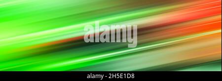 Gradient colorful fluorescenct green orange diagonal lines blurry striped blurred abstract background banner Stock Photo