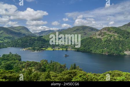 Views of Ullswater Lake taken from the hill side opposite the small Cumbrian town of Glenridding in the Lake District. Stock Photo