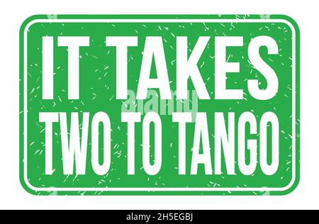 IT TAKES TWO TO TANGO, words written on green rectangle stamp sign Stock Photo