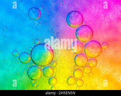 Oil and soap bubbles in water Stock Photo