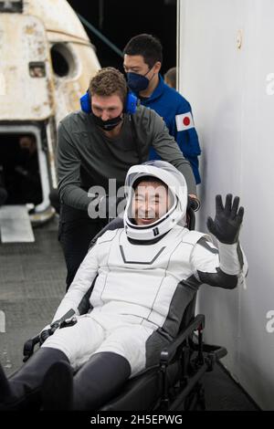 Florida, USA. 09th Nov, 2021. Japan Aerospace Exploration Agency (JAXA) astronaut Aki Hoshide waves after being helped out of the SpaceX Crew Dragon Endeavour spacecraft onboard the SpaceX GO Navigator recovery ship after he and NASA astronauts Shane Kimbrough and Megan McArthur, and ESA (European Space Agency) astronaut Thomas Pesquet landed in the Gulf of Mexico off the coast of Pensacola, Florida, on Monday, November 8, 2021. Credit: UPI/Alamy Live News Stock Photo
