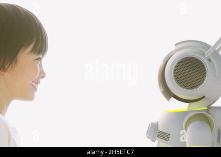 Composite image of robot interaction with human Stock Photo