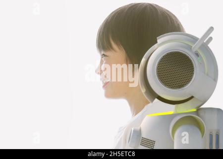 Composite image of robot interaction with human Stock Photo