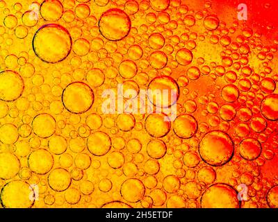 Oil bubbles in water Stock Photo
