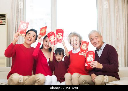 Happy families congratulating the new year Stock Photo