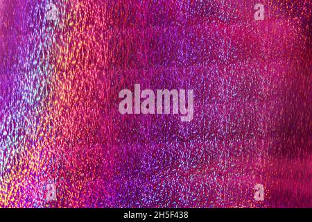 Abstract colorful holographic futuristic texture, purple background Stock Photo