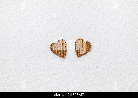 Valentine's day concept. Two hearts in the snow. Stock Photo