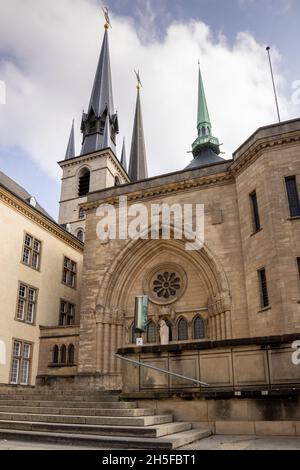 Entrance door and towers of the Notre Dame chruch in Luxembourg city on a cloudy day. Stock Photo