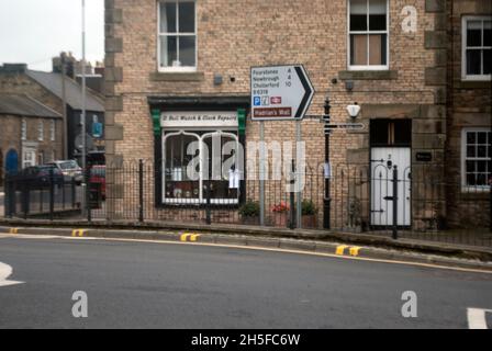 D Bell Watch and Clock Repairs shop and sign to Fourstones, Newbrough, Chollerford, B6319, Hadrians Wall, Haydon Bridge, Northumberland, England, UK Stock Photo