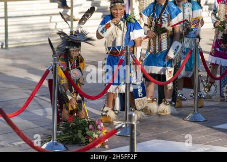 Arlington, United States. 09th Nov, 2021. Members of the Crow Nation place flowers during a centennial commemoration event at the Tomb of the Unknown Soldier, in Arlington National Cemetery in Arlington, Virginia on November 9, 2021. Pool Photo by Alex Brandon/UPI Credit: UPI/Alamy Live News Stock Photo