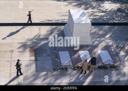 Arlington, United States. 09th Nov, 2021. People place flowers during a centennial commemoration event at the Tomb of the Unknown Soldier, in Arlington National Cemetery in Arlington, Virginia on November 9, 2021. Pool Photo by Alex Brandon/UPI Credit: UPI/Alamy Live News Stock Photo