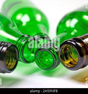 Empty glass bottles in the colors green and brown Stock Photo