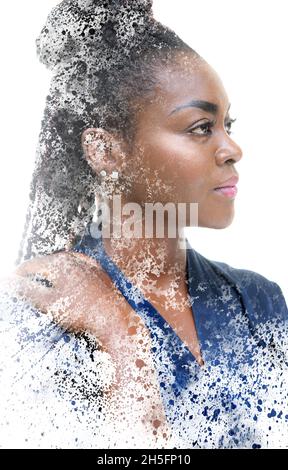 Paintography. A portrait of a woman combined with various watercolor splashes against a white background. Stock Photo