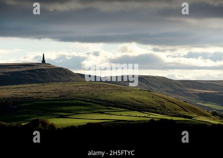 Hill farm near Stoodley Pike Monument on the moors of the upper Calder Valley and the market town of Todmorden. Stock Photo