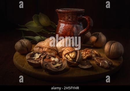 walnuts on a dark background in a rustic style Stock Photo