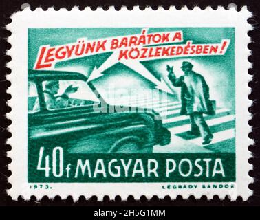 HUNGARY - CIRCA 1973: a stamp printed in Hungary dedicated to traffic rules, lets be friends in traffic, circa 1973 Stock Photo