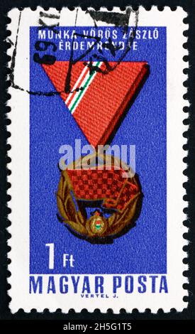 HUNGARY - CIRCA 1966: a stamp printed in Hungary shows Red Banner Order of Labor, Decoration, circa 1966 Stock Photo