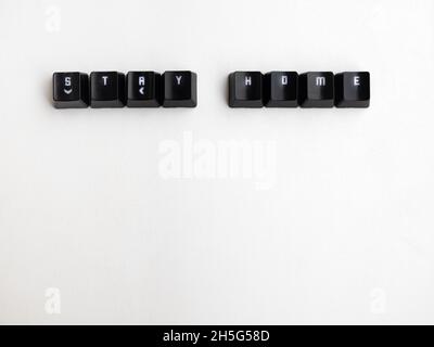 Keys with the word stay home with white background Stock Photo