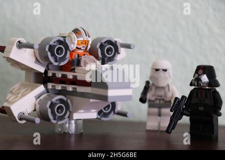 A small display of a few Lego Star Wars figures and spaceship Stock Photo