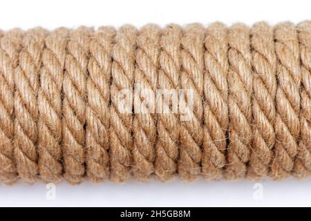 Close-up of sisal rope on white background. Top view, selective focus. Stock Photo