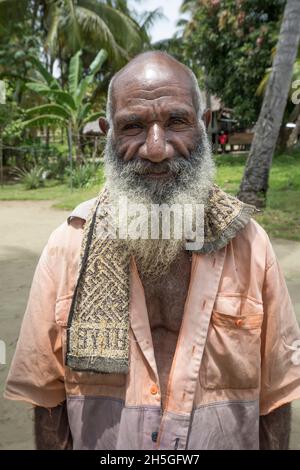 Local man with beard in Mou Village, Morobe Bay, Morobe Province, Papua New Guinea; Mou Village, Morobe Province, Papua New Guinea Stock Photo