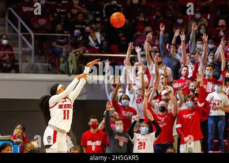 Raleigh, NC, USA. 9th Nov, 2021. NC State Wolfpack forward Jakia Brown-Turner (11) shoots a three in the first half against the South Carolina Gamecocks in the NCAA Womens Basketball matchup at Reynolds Coliseum in Raleigh, NC. (Scott Kinser/Cal Sport Media). Credit: csm/Alamy Live News Stock Photo