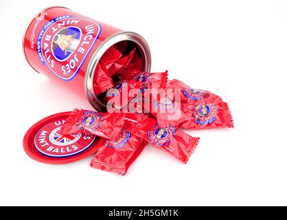 Tin of Uncle Joe's mint balls a classic British traditional hard boiled sweets produced by William Santus in Wigan Greater Manchester Stock Photo