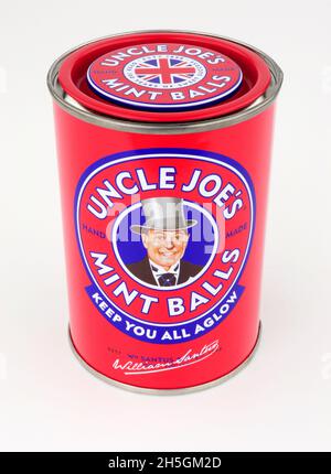Tin of Uncle Joe's mint balls a classic British traditional hard boiled sweets produced by William Santus in Wigan Greater Manchester Stock Photo