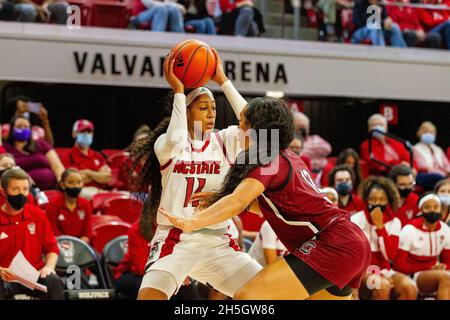 Raleigh, NC, USA. 9th Nov, 2021. NC State Wolfpack forward Jakia Brown-Turner (11) under pressure from South Carolina Gamecocks guard Brea Beal (12) in the second half of the NCAA Womens Basketball matchup at Reynolds Coliseum in Raleigh, NC. (Scott Kinser/Cal Sport Media). Credit: csm/Alamy Live News Stock Photo