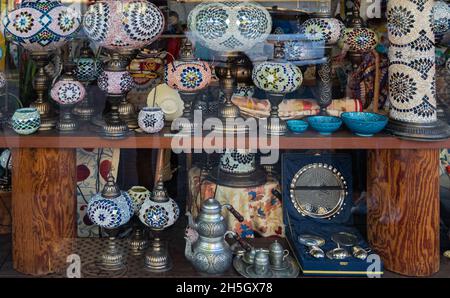 Oriental lamps in brass with colorful glasses in souvenir shop. Very popular lamps in the middle east. Street photo, travel photo, selective focus-Jul Stock Photo