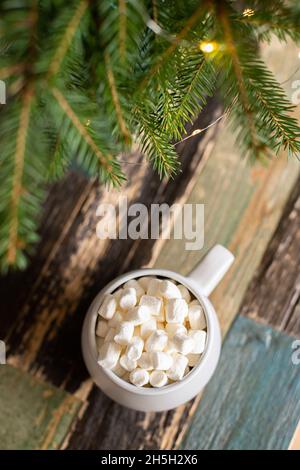 Tree branch with tasty marshmallows on color background Stock Photo Alamy