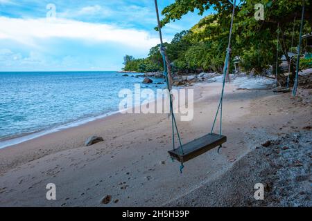 Ao Sane Jungle beach Phuket Thailand, beach with rocks and blue ocean in Phuket Thailand Stock Photo