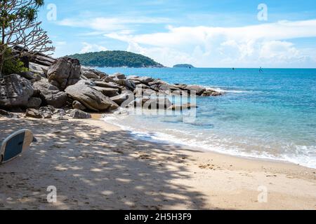 Ao Sane Jungle beach Phuket Thailand, beach with rocks and blue ocean in Phuket Thailand Stock Photo