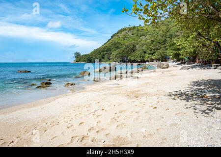 Ao Sane Jungle beach Phuket Thailand, beach with rocks and blue ocean in Phuket Thailand Stock Photo