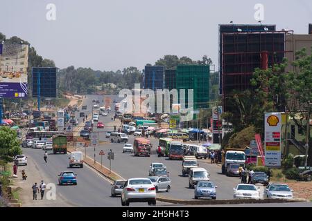 Traffic on the newly widened Ngong Road, Karen, Nairobi.  The 2.3 billion Kenya shilling project was carried out by the Chinese firm, Quinjian Interna Stock Photo